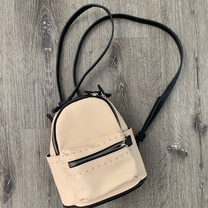 Backpack purse with silver hardware